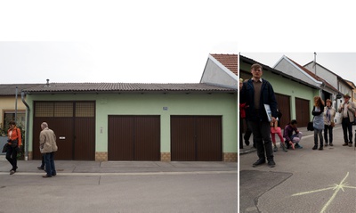 _05 – Dominik Scheuch erläutert den Straßenverlauf. Wir mutmaßen über die Geschichte des grünen Hauses, das in eine Garage umfunktioniert wurde.